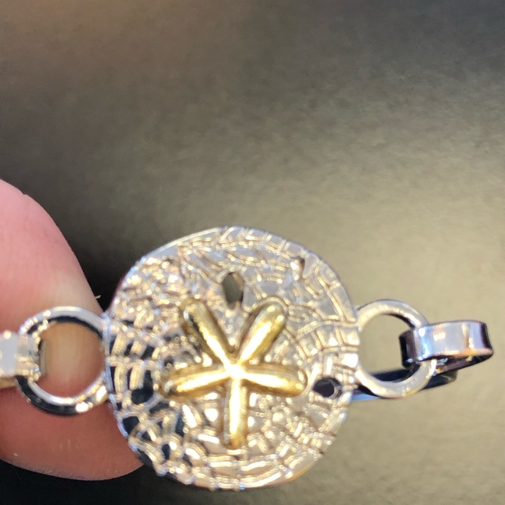 Cape Cod styled costume bracelet.  Silver with gold starfish.  As shown